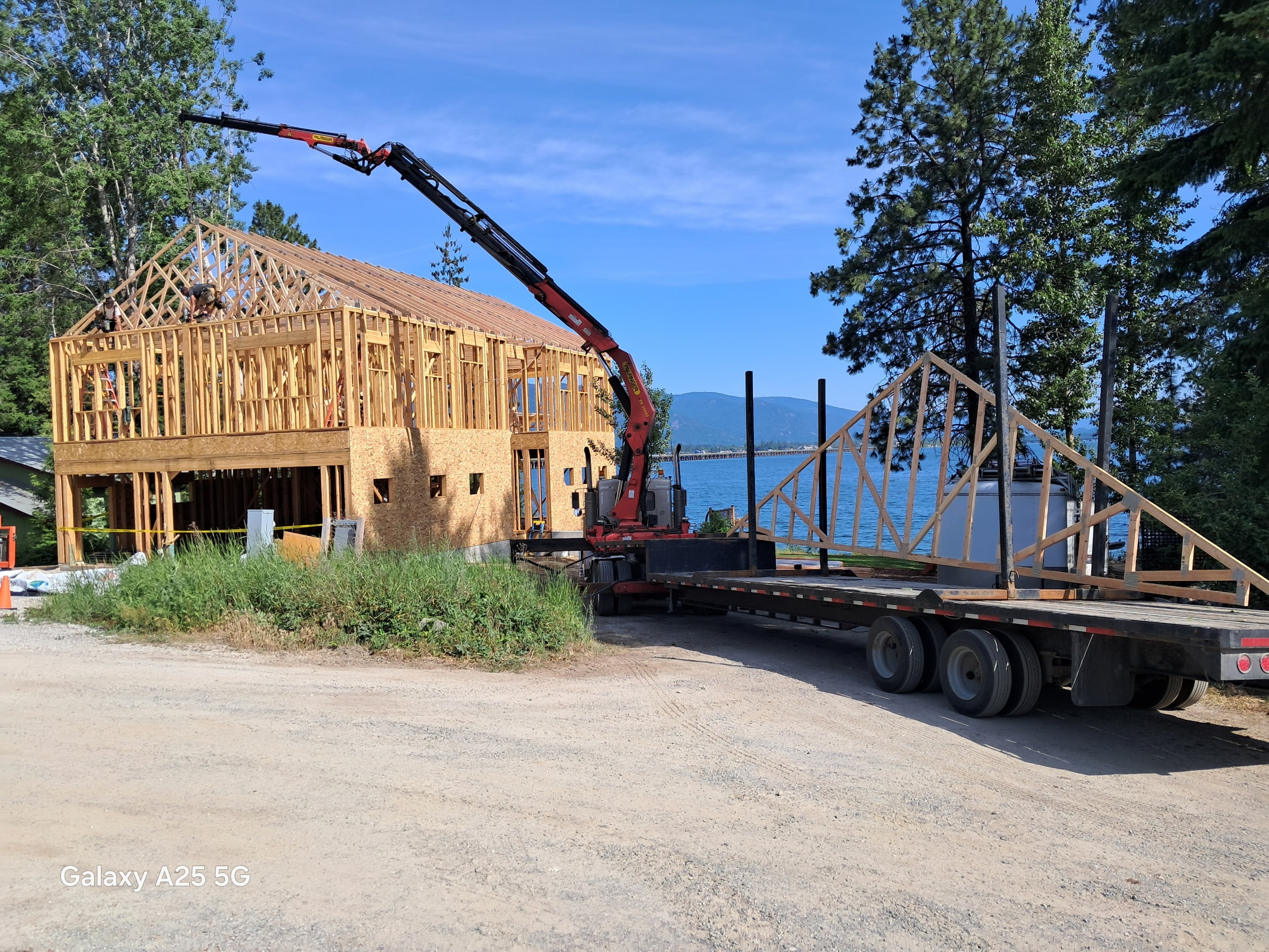 TrussTek delivery truck at a construction jobsite